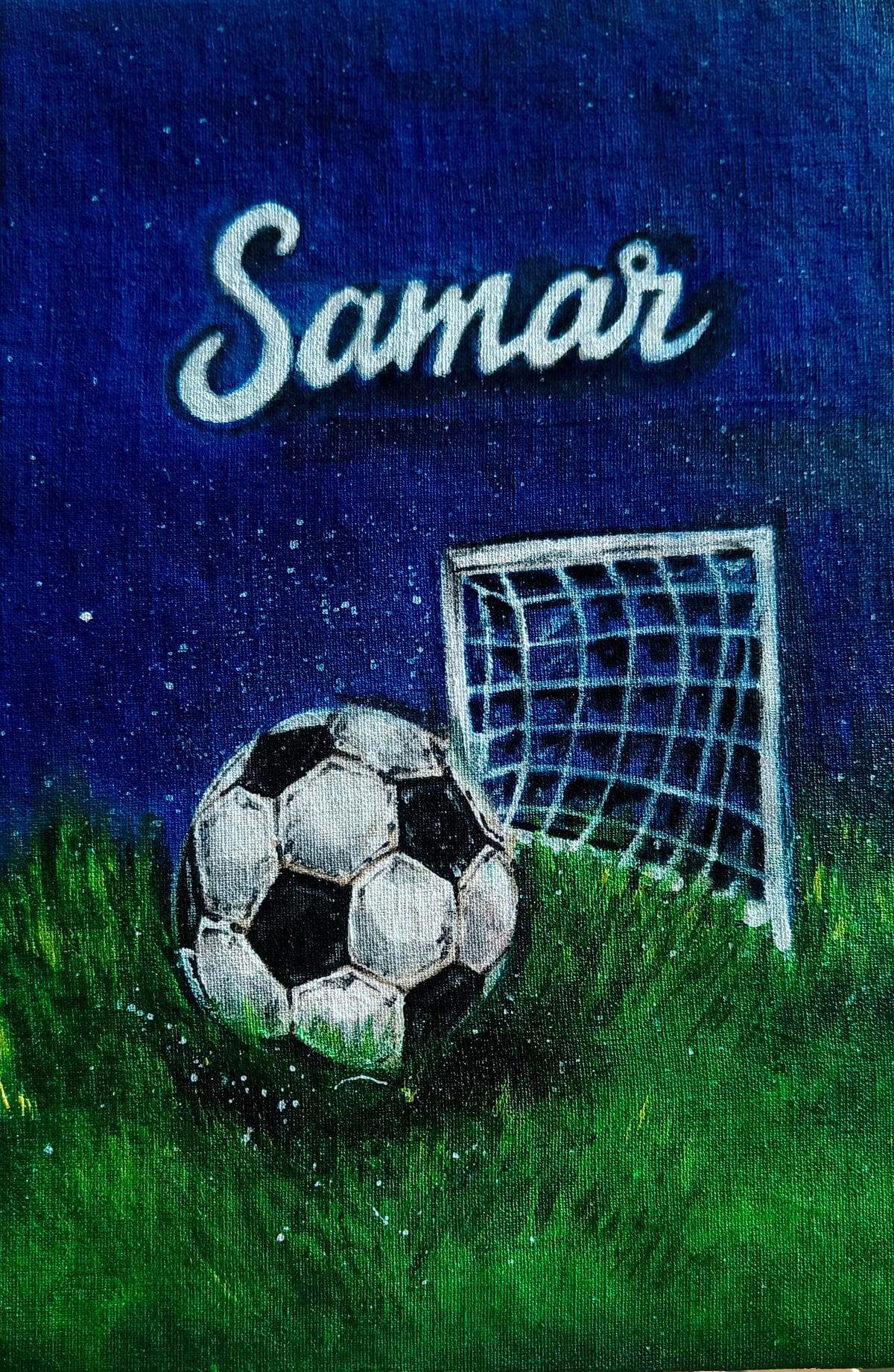 Hand-painted acrylic journal cover: a football resting in green grass in front of a goal net under a starry navy sky, with the name “Samar” lettered at the top